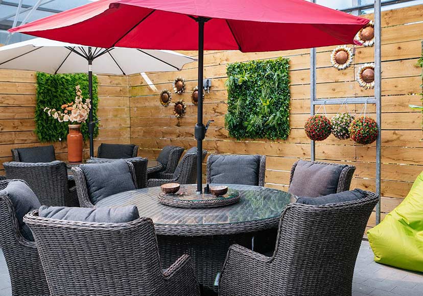 Umbrella and table sets available at Fernhill Garden Centre.