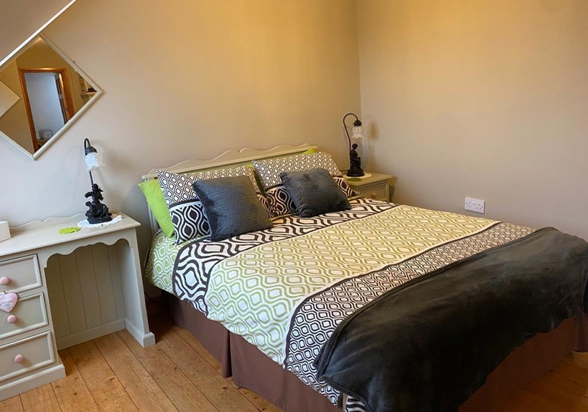 Double bed at Glasson Stone Lodge.